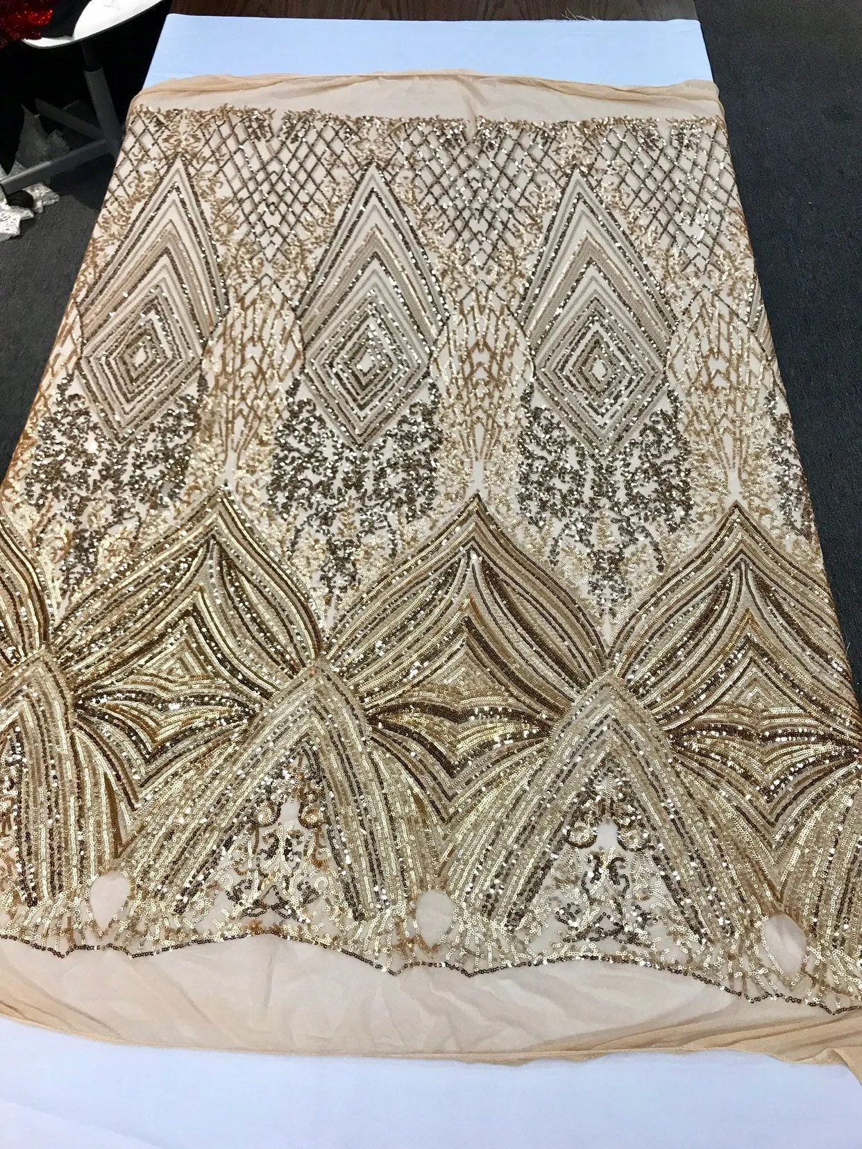 Gold sequin diamond design embroidery on a 4 way stretch mesh-sold by the yard.