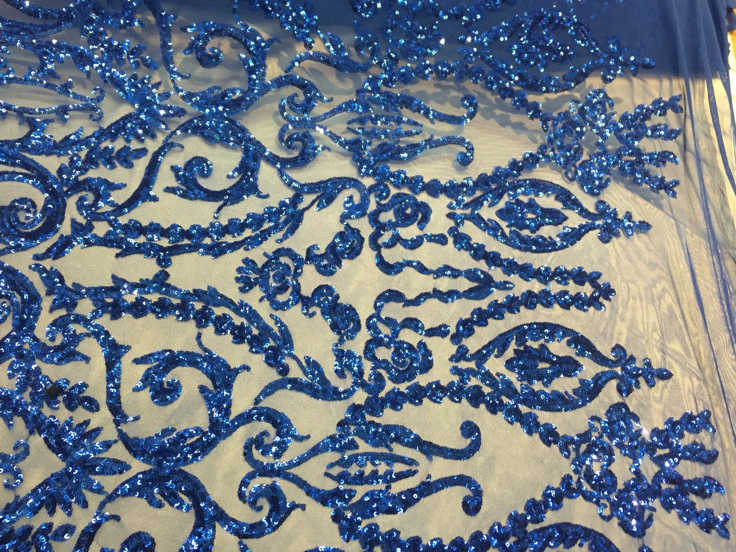 Royal blue damask design embroider with sequins on a 2 way stretch mesh-prom-nightgown-dresses-decorations-sold by the yard.