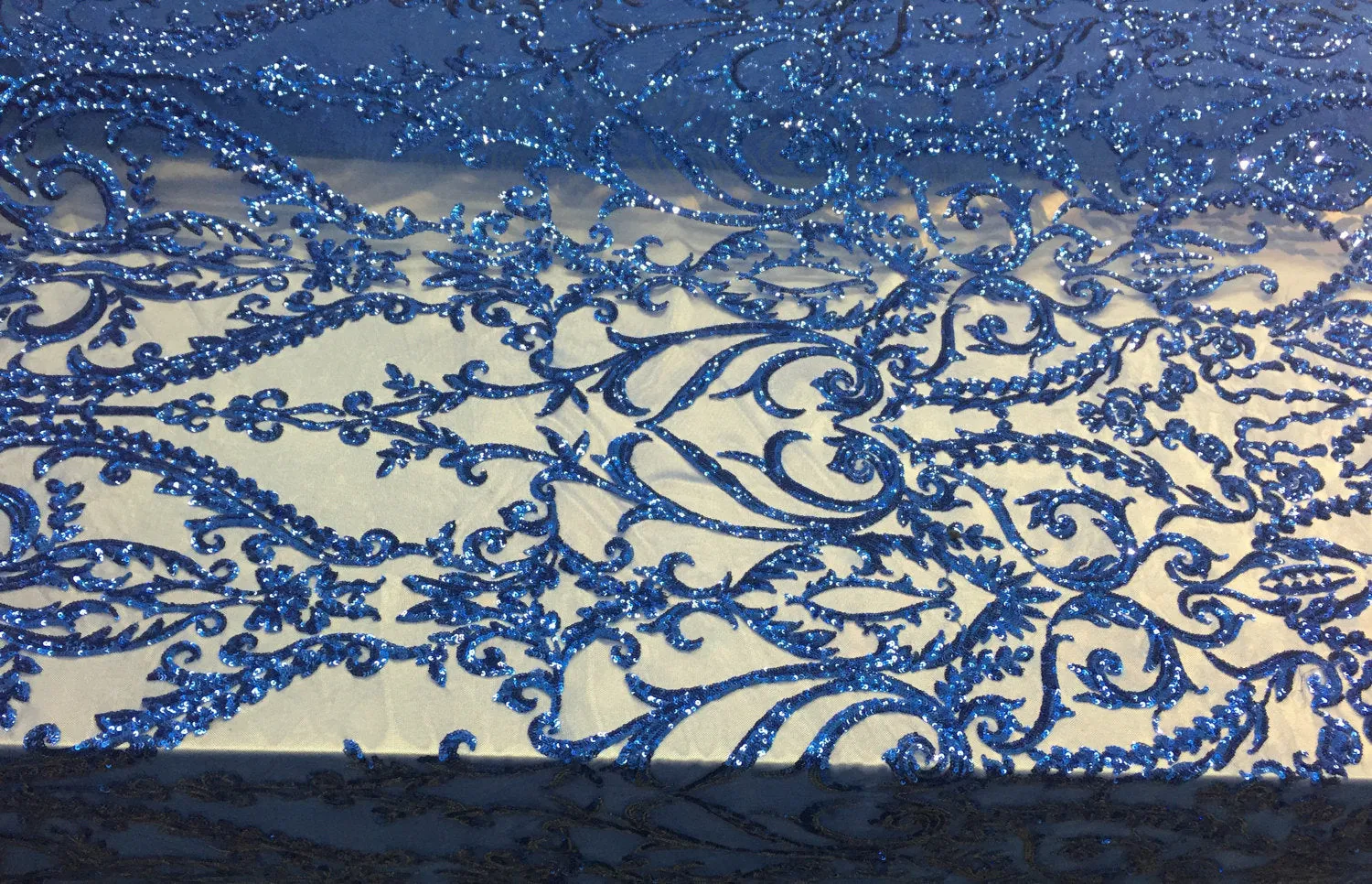 Royal blue damask design embroider with sequins on a 2 way stretch mesh-prom-nightgown-dresses-decorations-sold by the yard.