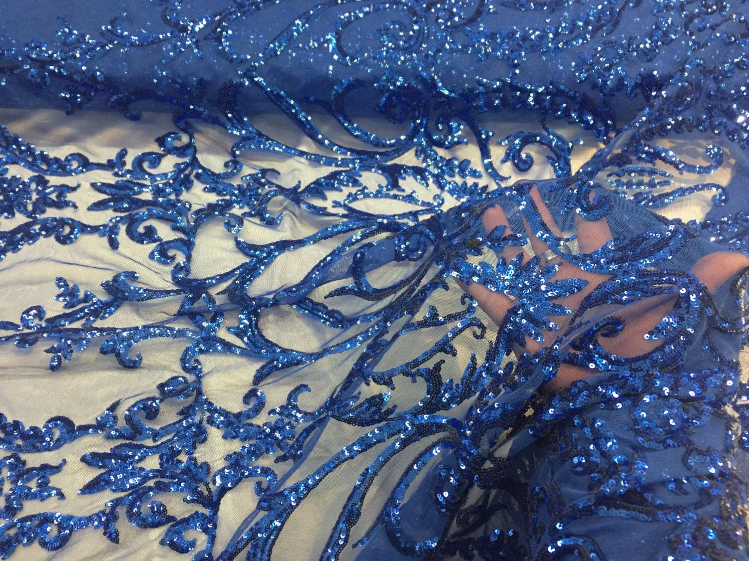 Royal blue damask design embroider with sequins on a 2 way stretch mesh-prom-nightgown-dresses-decorations-sold by the yard.